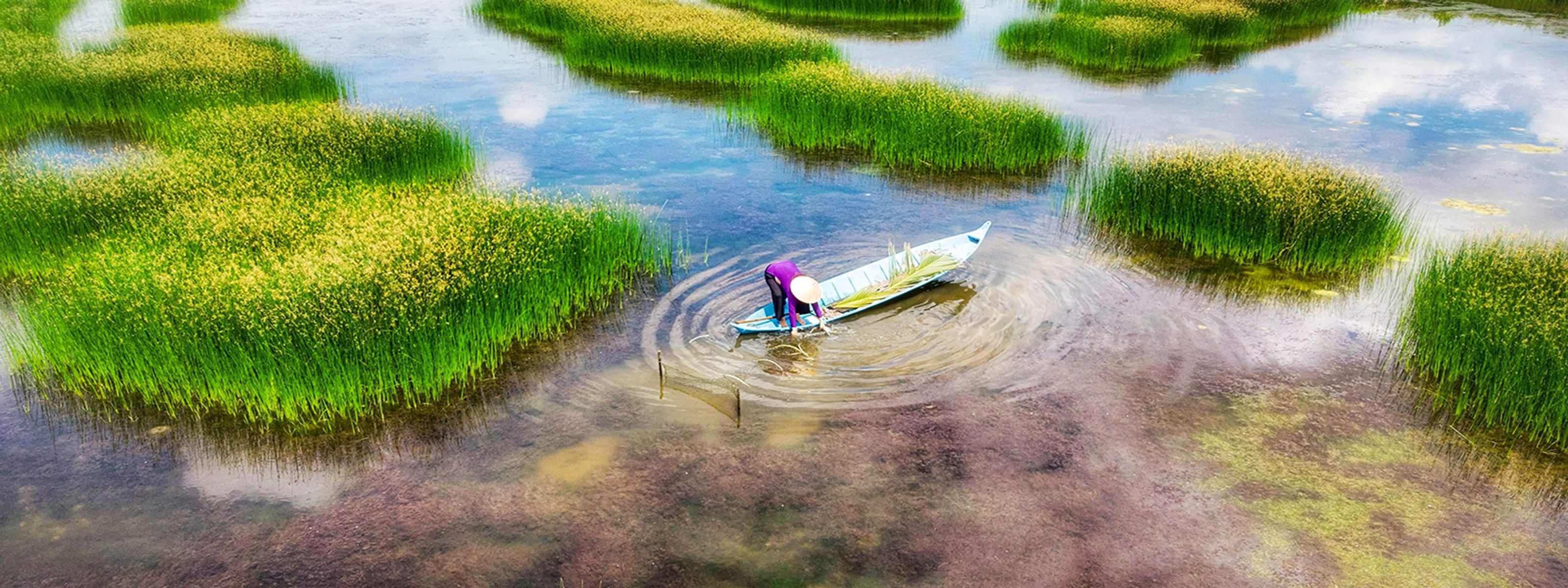 Fischer im Mekong-Delta