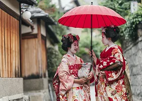 Maiko Geisha Walking on a street of Gion in Kyoto